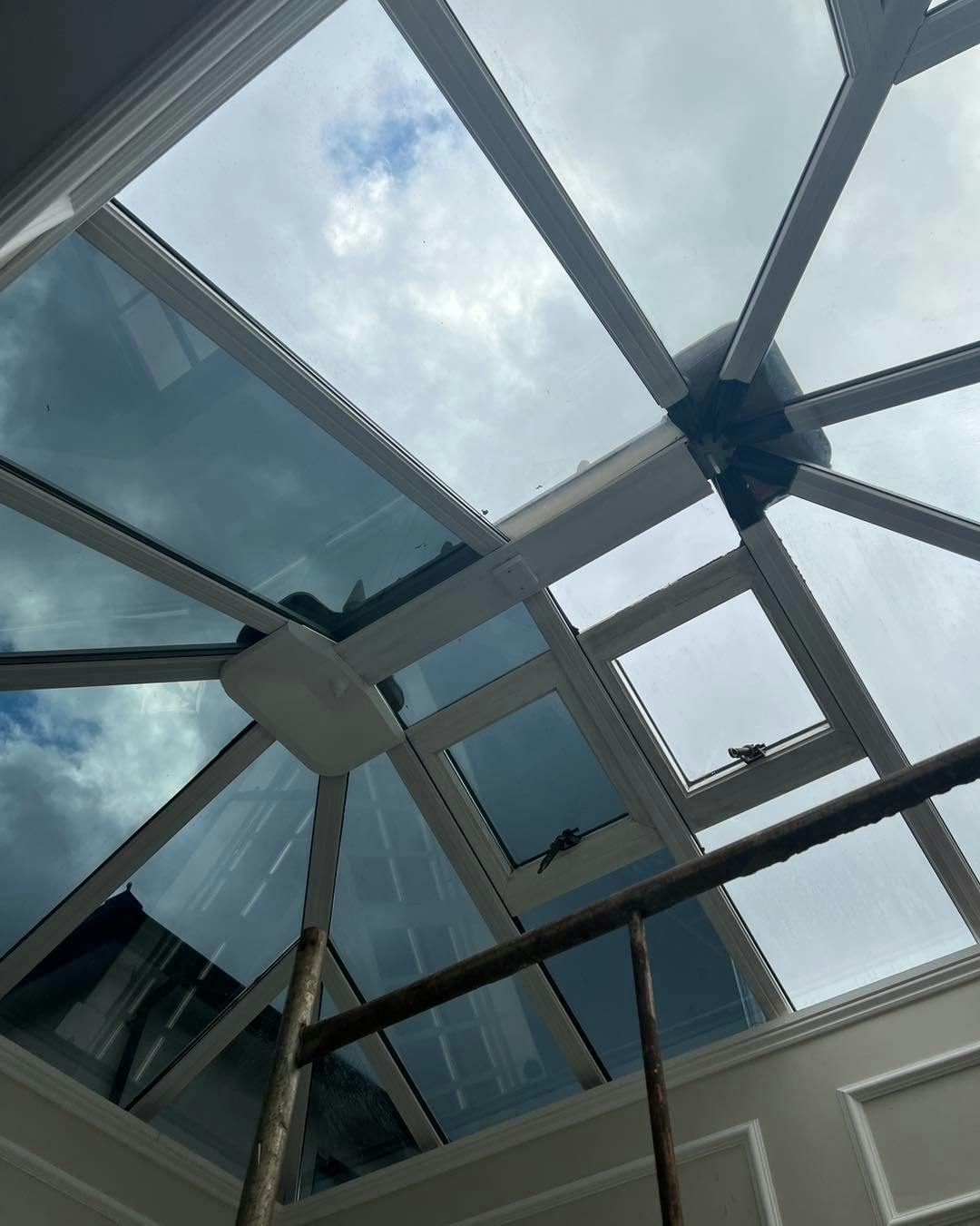 About us header image showing conservatory tinted roof glass